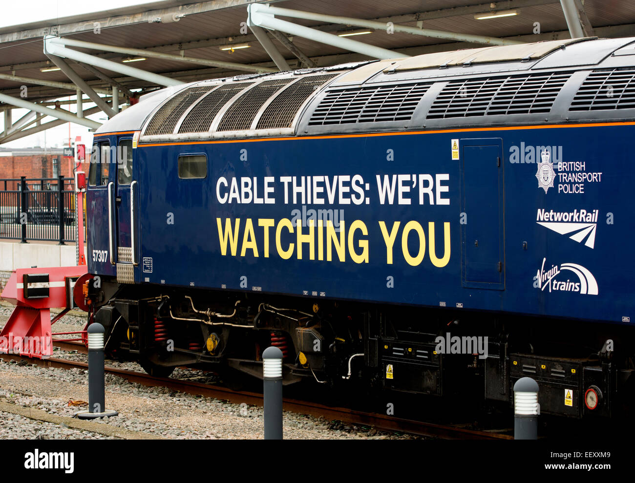 Direct Rail Services class 57 diesel 'Cable thieves we`re watching you' liveried locomotive. Stock Photo